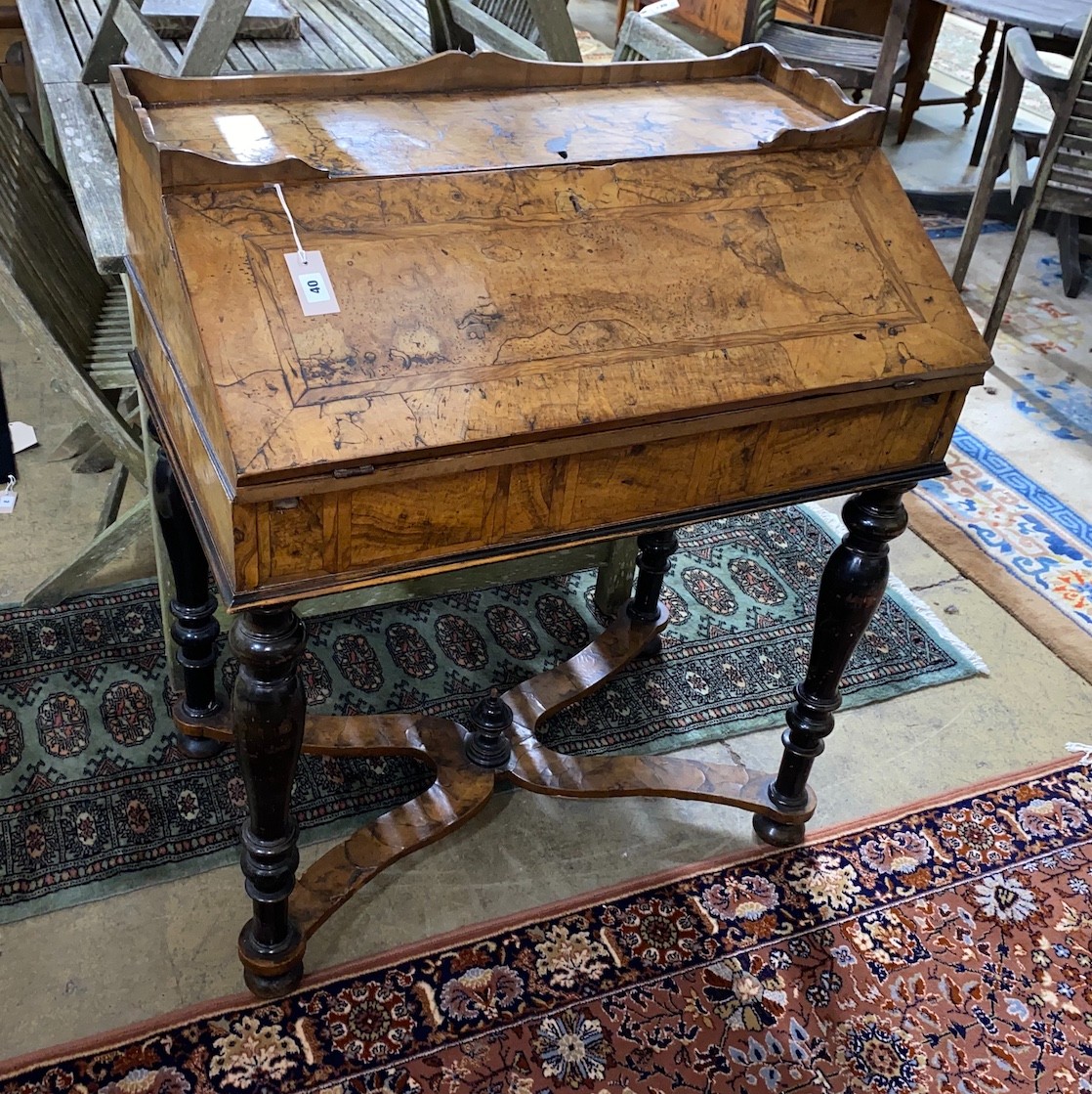 An 18th century Dutch figured walnut bureau with 'X' stretcher, width 84cm, depth 53cm, height 100cm